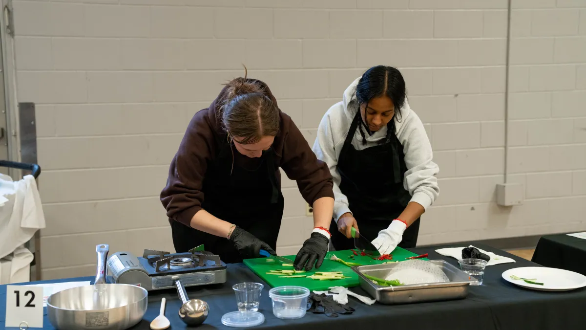 Students practicing knife skills